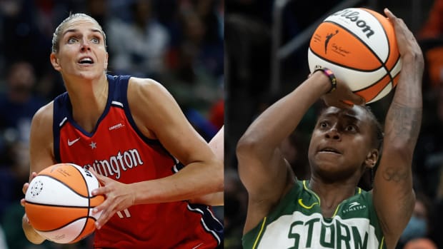 Mystics forward Elena Delle Donne looks to shoot a basket. Storm guard Jewell Loyd shoots a basket.